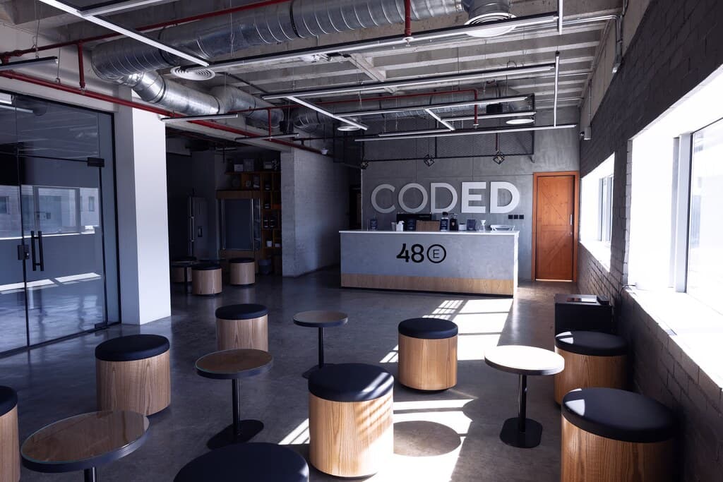 The sunlit CODED 48°E commons space